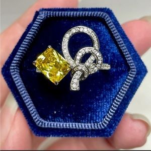 Yellow baguette cut knot ring